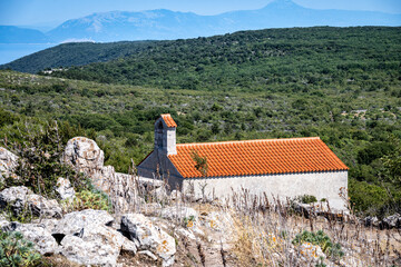 St. Stephen chapel at thee cemetery in the village of Lubenice, Croatia, placed high above the sea on the Cres island