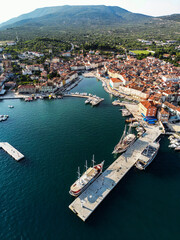 Aerial view of lovely town of Cres, in the Croatian sea, named after the island on which it is built and its port full of anchored boats