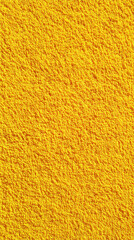 Vivid yellow textured background showing the detailed surface of a yellow material. The soft texture and vibrant color make it ideal for design, branding, packaging, posters, and website backgrounds. 