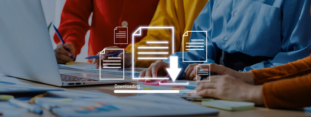 Diverse professionals engage in teamwork at a modern office, collaborating on project tasks with documents and laptop, focusing on data downloading and organization. Trope