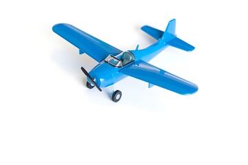 Generative AI a vibrant blue airplane on a white backdrop.