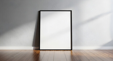 Vertical Black Frame Mockup with Blank Canvas Leaning on Gray Textured Wall