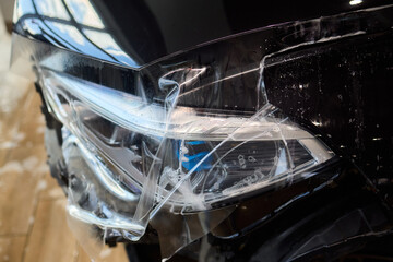 Applying a Protective Film on the Surface of Your Car for Enhanced Durability and Shine