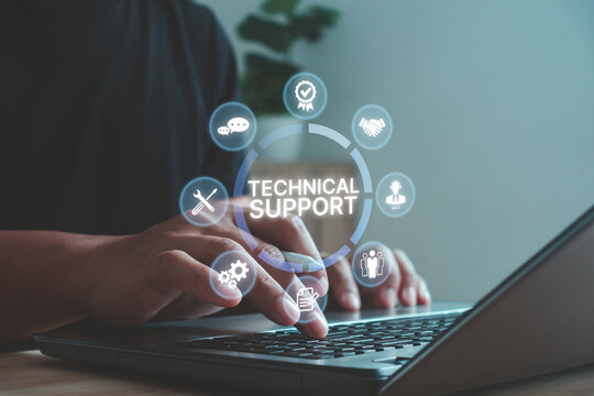 IT professional providing technical support on laptop with digital service icons. Concept of online help desk, customer service, troubleshooting and 24-7 assistance for business technology solutions. - Powered by Adobe