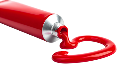 A tube extrudes vibrant red paint, forming a heart shape against a black backdrop