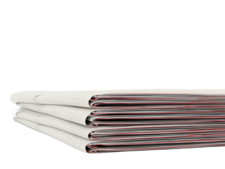 journalism. Artistic stack of newspapers under soft overhead light on a minimalist grey surface. lifestyle magazines, social media lookbooks, designed for influencer and brand collaborations.