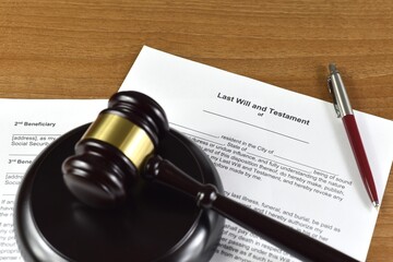 Last will and testament with judges gavel. Inheritance after the deceased.