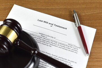 Last will and testament with judges gavel. Inheritance after the deceased.