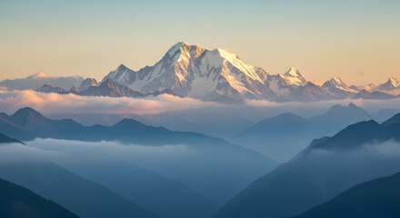 Snow Capped Mountain Peaks Overlooking Foggy Blue Ridges