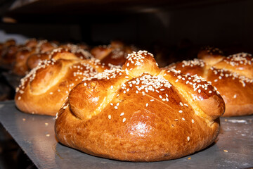 Pan de muerto baking on tray for day of the dead