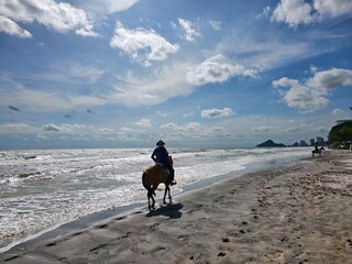 horse on the beach of Hua Hin, Thailand