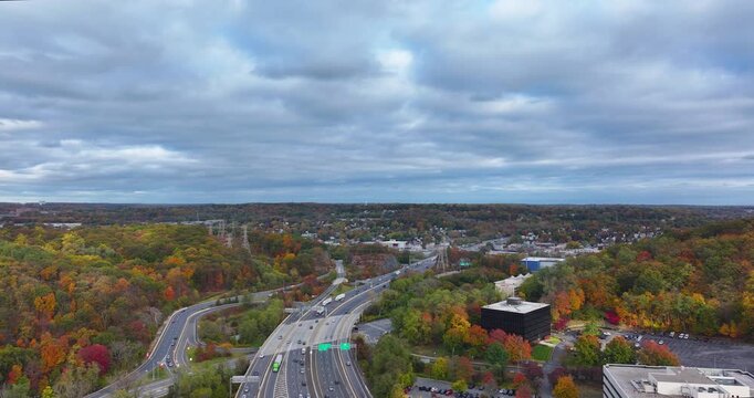 Fall afternoon aerial video over Interstate 87, 287,  Elmsford, NY in Westchester County.