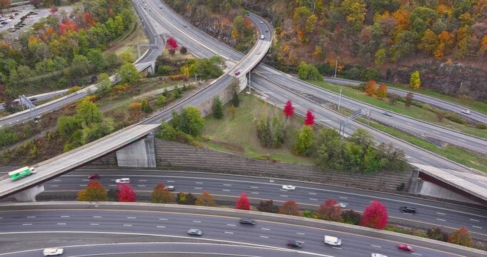 Fall afternoon aerial hyper lapse video over Interstate 87, 287,  Elmsford, NY in Westchester County.