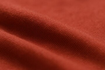 Fototapeta premium Close-up of Textured Red Fabric: Soft, Woven Material Showing Depth and Subtle Pattern for Textile Designs