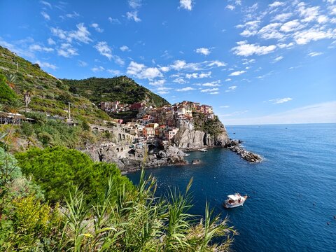 Manarola village in Cinque Terre, Italy - Powered by Adobe