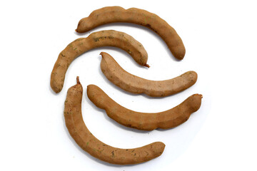 Fresh tamarind on a white background.