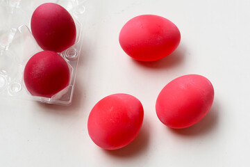 Pink preserved eggs (century eggs) on a whit