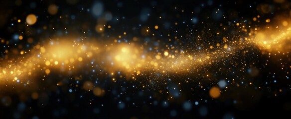 Glowing golden and blue sparkling particles scattered across a dark background creating a magical and ethereal effect