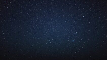 Obraz premium A captivating dark night sky filled with countless shimmering stars, creating an awe-inspiring celestial tapestry and a serene view of the vast, mysterious universe