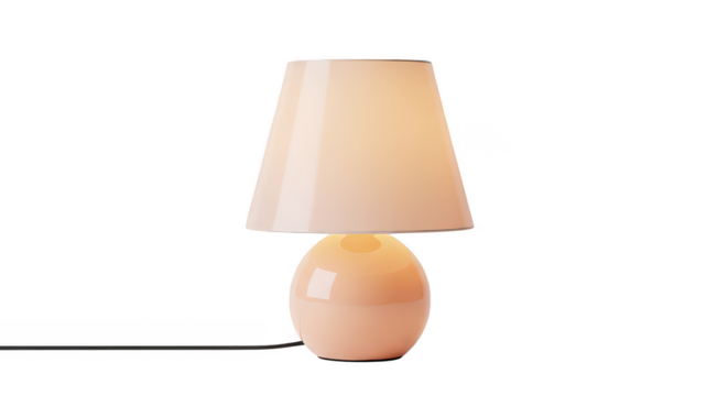 Modern Peach Table Lamp With Warm Glow On Black Background