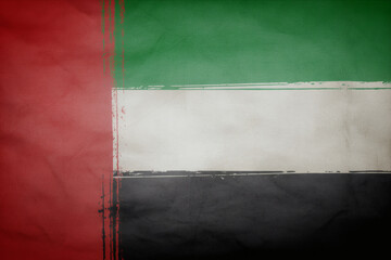 Distressed United Arab Emirates flag conveying resilience and national pride with a vintage texture and patriotic feel