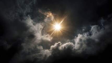 A bright sun shines through dark dramatic storm clouds casting radiant rays and creating an intense atmospheric scene