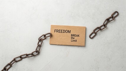 Concept of Freedom and Breaking Limits with Chain and Card Message Isolated on Light Background