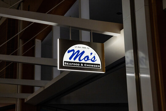 Portland, Oregon \ USA - 14 November 2024: Mo's Seafood & Chowder restaurant sign established 1946 at Portland International Airport terminal