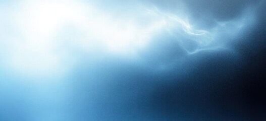 Soft glowing blue light blending into dark space creating a serene and mysterious atmosphere with subtle wisps of light