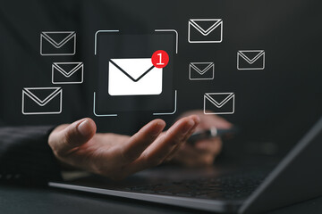 Businesswoman reading electronic mail, Email marketing and newsletter concept, Digital communication with email messages, Sending and receiving messages online with the email icon, notifications