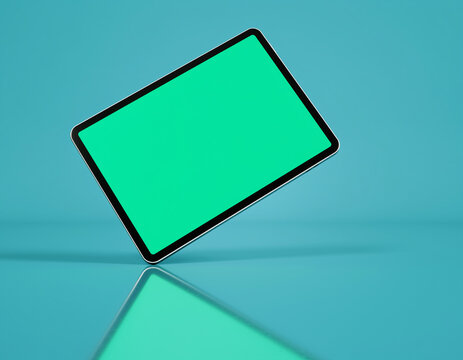 A minimalist tablet mock-up stands at an angle, displaying a blank green screen for easy content insertion. The bright, clean shot features a reflective cyan background, ideal for technology and appli