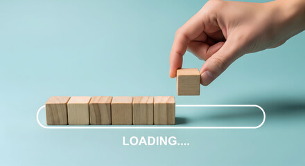 Watch progress build with wooden blocks loading bar on pastel background