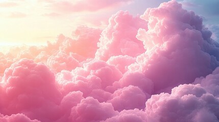 Soft, fluffy pink clouds glowing warmly under the golden light of sunrise or sunset, evoking a peaceful and dreamy atmosphere