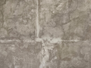 Close up of concrete washed cement texture with brush stroke, grunge, and dirt pattern. Suitable for wall and floor finishes. Seamless background texture.