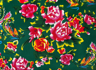 Close up of Chinese theme floral art graphic illustration printed on wallpaper or fabric. In green and red color. Oriental east asian lotus flower pattern. Seamless background © TMR Studio