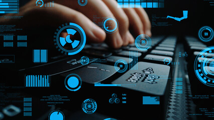 Hands are actively typing on a laptop keyboard, surrounded by a dynamic digital data overlay, emphasizing modern technology and innovation in a sleek dark environment. Xenic