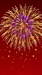 Fototapeta premium A vibrant burst of fireworks illuminates the night sky, showcasing a dazzling array of golden and purple sparks against a deep red backdrop.
