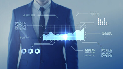 Businessman analyzing virtual data futuristic holographic dashboard business intelligence BI financial analysis big data visualization. stock market investment trends financial performance statistics