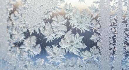 Beautiful frost ice crystals on cold winter window.