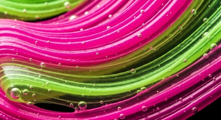 Swirl of neon pink and green goo with air bubbles