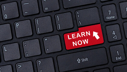 Learn now symbol. Learn now icon. Learn now logo. Learn Now words on a red computer keyboard button.