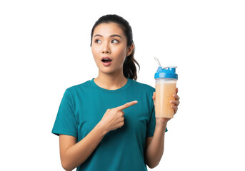 Surprised asian woman holding protein shake pointing with teal shirt fitness isolated on transparent background