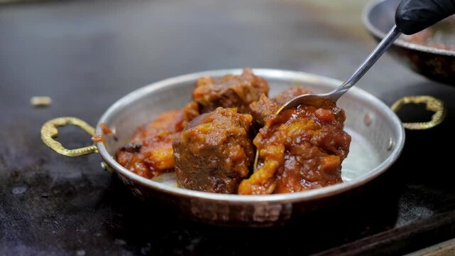 Slowcooked juicy beef pieces, Hearty braised beef served with aromatic masala sauce, Tender tenderloin pieces braised slowly in flavorful spicy gravy with aromatic spices