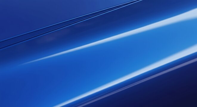 Abstract view of a glossy blue car hood with two narrow lines and a large area of light reflecting diagonally across it