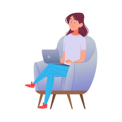 Smiling young woman sits comfortably in an armchair, using her laptop.