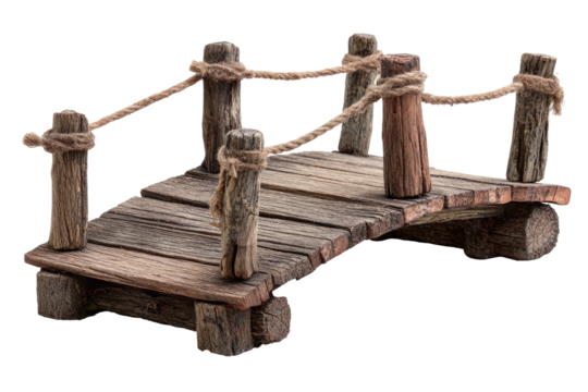 Rustic miniature wood bridge with rope railing