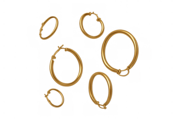 Gold hoop earrings in various sizes, luxurious metal circle jewelry, modern fashion accessory, elegant design