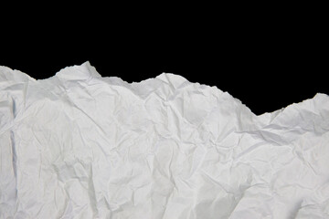 White paper cut with torn edges isolated on black background.