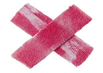 Crossed red candy with white stripes, macro shot