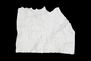 White paper cut with torn edges isolated on black background.